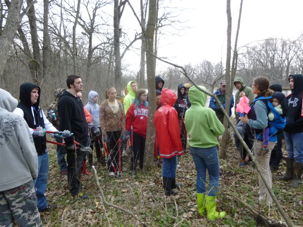 The group listening to history and id of buckthorn and how they can be involved in roadside monitoring